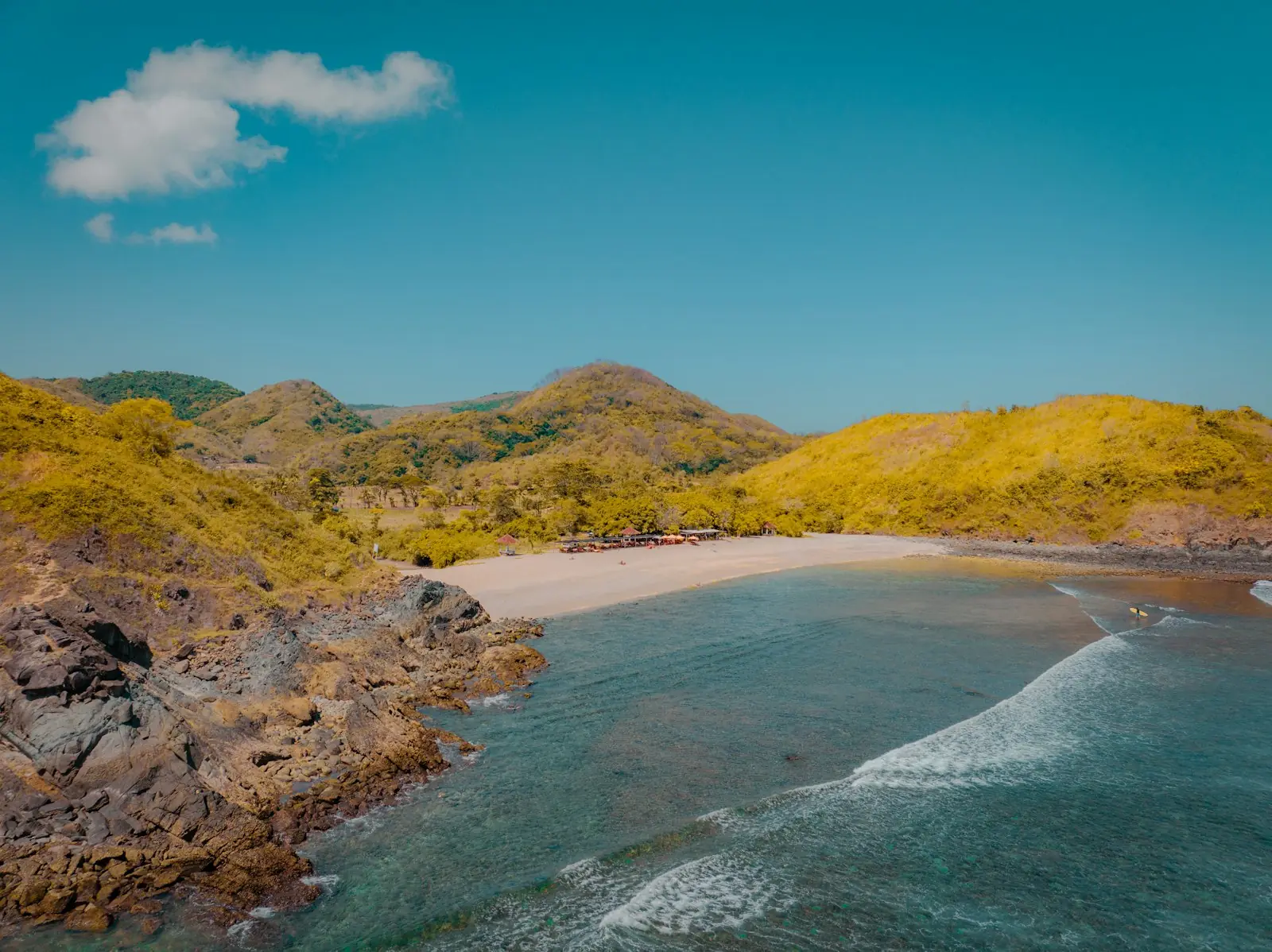 Golden hills above a quiet beach